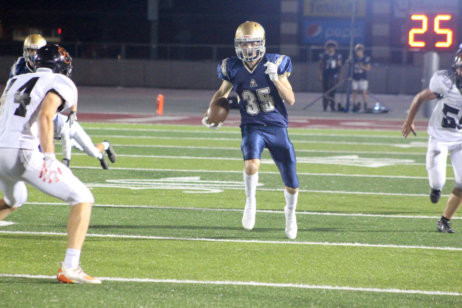 Collin Conzemius returns a kickoff